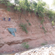 The team at work along the cliff wall in 2007, at the East African Rift System in Tanzania.